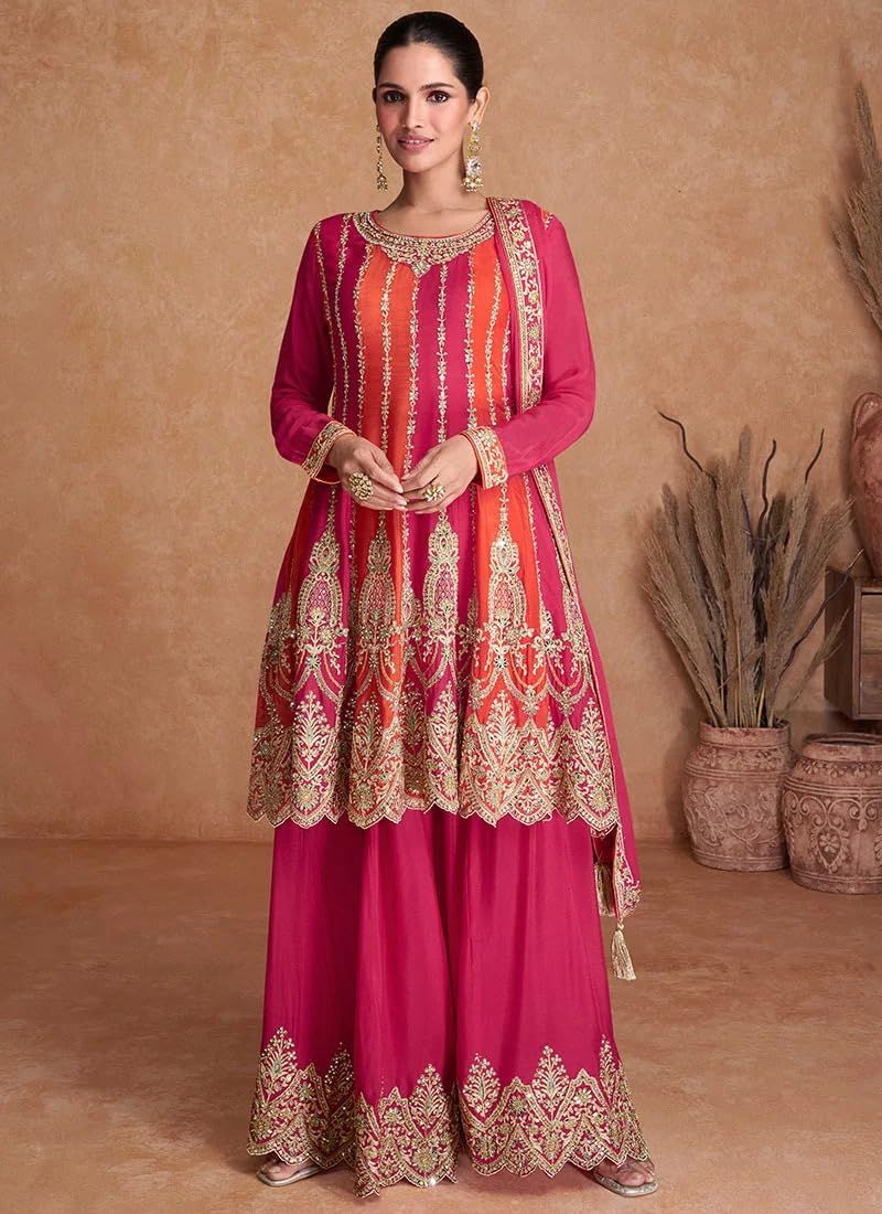 fancy pink plazo suit is the pride of women fashion.